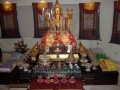 Lama Je Tsongkhapa altar at Kechara House 1 with extensive Tsog offerings.jpg